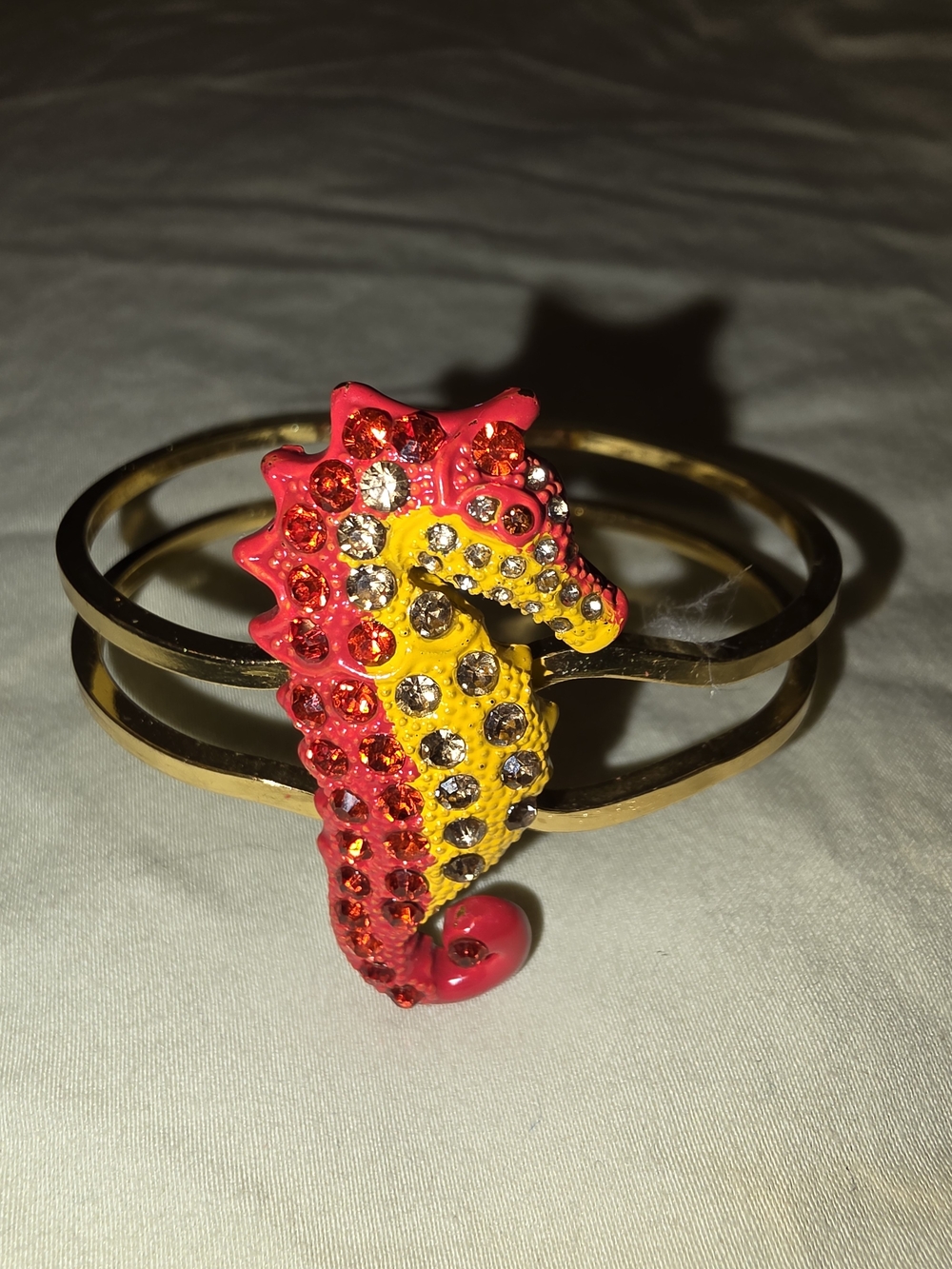 Source Unknown Gold Cuff Bracelet with Yellow and Red Seahorse